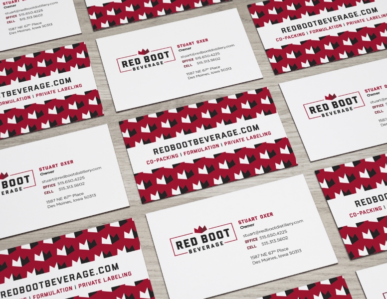 Red Boot Beverage business cards arranged in a pattern