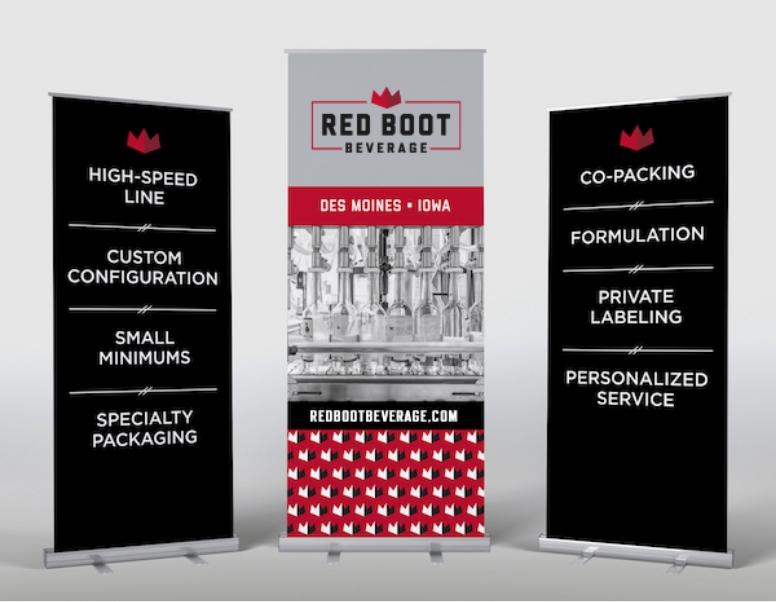 Three vertical trade show banners for Red Boot Beverage