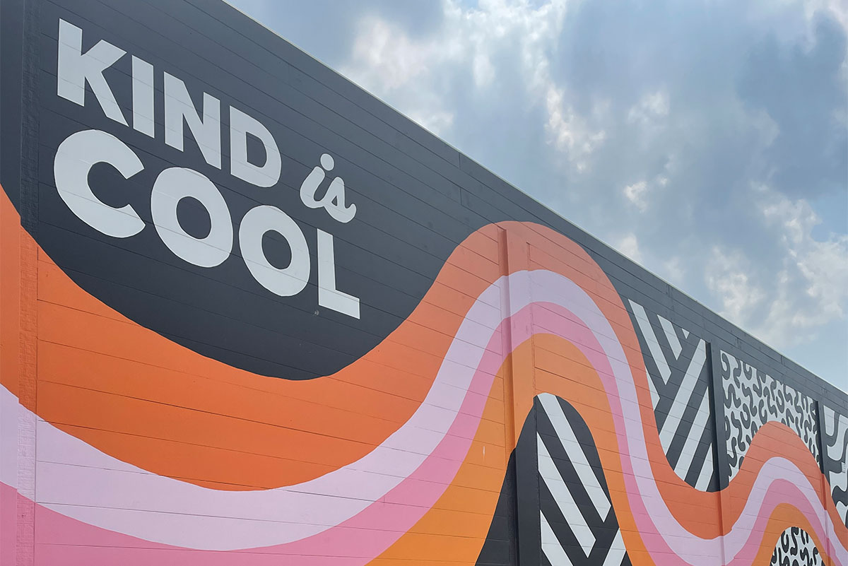 "Kind is Cool" mural outside P7 office in des moines