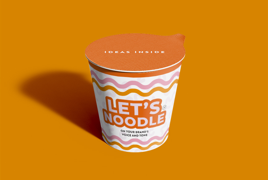a cup of noodles with the words 'Let's Noodle" on the label, on an orange background.