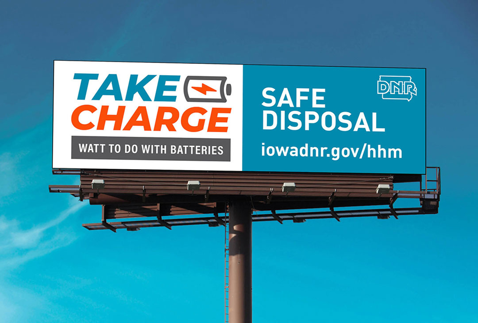 Iowa Department of Natural Resources Take Charge campaign billboard for safe battery disposal