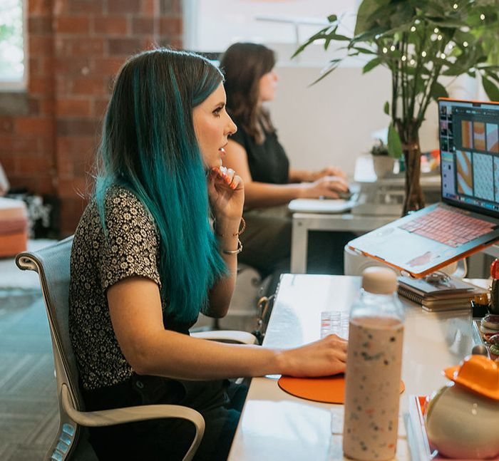 Jess working at her desk